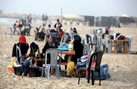 Palestinians getting ready for break their fast at Gaza beach during the fasting holy month of Ramadan, in Gaza city on 26 July 2012. Muslims throughout the world are celebrating the fasting month of Ramadan, the holiest...