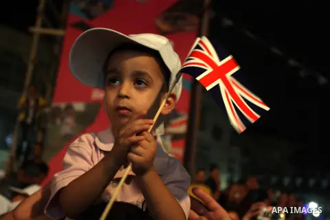 Palestinians celebrate of the opening Olympics Games in London, on July 27, 2012, in the West Bank city of Ramallah. Photo by Issam Rimawi