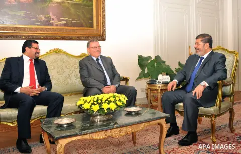 Egyptian President Mohamed Morsi (R) meets with Libyan Foreign Affairs Minister Ashur bin Khayal (C) and Tunisian Foreign Minister Rafik Abdessalem (L), at the presidential palace, in Cairo, Egypt, 29 July 2012. Photo by...