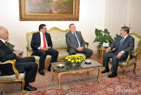 Egyptian President Mohamed Morsi (R) meets with Libyan Foreign Affairs Minister Ashur bin Khayal (C) and Tunisian Foreign Minister Rafik Abdessalem (L), at the presidential palace, in Cairo, Egypt, 29 July 2012. Photo by...