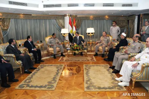 President Mohamed Morsi, participates in ceremony breakfast with Leaders of the armed forces in club Al Jalaa' in Cairo on July 30, 2012. Photo by EGYPTIAN PRESIDENCY