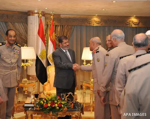 President Mohamed Morsi, participates in ceremony breakfast with Leaders of the armed forces in club Al Jalaa' in Cairo on July 30, 2012. Photo by EGYPTIAN PRESIDENCY