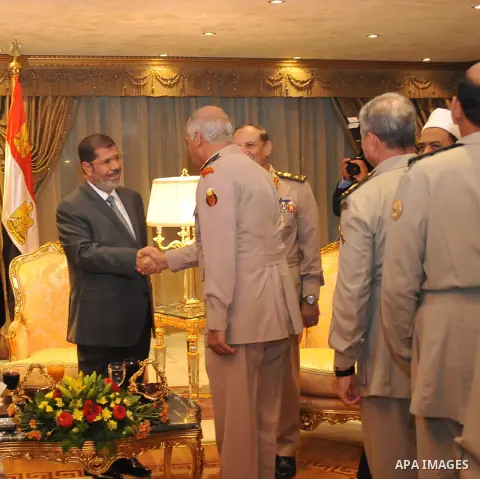 President Mohamed Morsi, participates in ceremony breakfast with Leaders of the armed forces in club Al Jalaa' in Cairo on July 30, 2012. Photo by EGYPTIAN PRESIDENCY