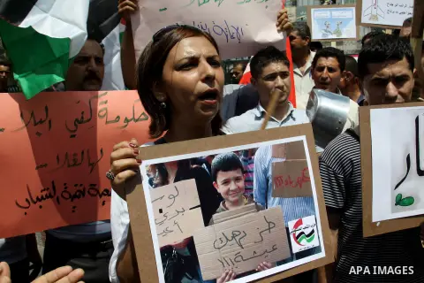 Palestinian demonstrators participate protest against rising prices and taxes in the West Bank, city of Nablus Aug. 04, 2012. Photo by Nedal Eshtayah