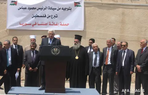 Palestinian President Mahmoud Abbas speaks to the media during a press event in the West Bank city of Ramallah August 5, 2012. An aid convoy left Ramallah on Sunday carrying food and medicine in a symbol of support for P...