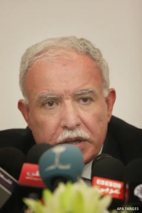 Palestinian foreign minister Riad al-Malki speaks to the press in the West Bank city of Ramallah on August 5, 2012, as Non-Aligned Movement (NAM) ministers gather in the neighboring Jordanian capital Amman to take part i...