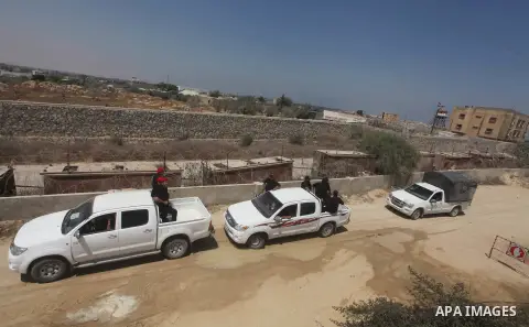 Palestinians Hamas security guard on duty on the border between Egypt and Gaza strip in Rafah town southern Gaza strip on, 06 August 2012. Reports state that at least five gunmen were killed after they tried to infiltrat...