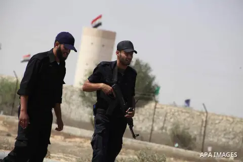 A Palestinian Hamas security guard on duty on the border between Egypt and Gaza strip in Rafah town southern Gaza strip on, 06 August 2012. Reports state that at least five gunmen were killed after they tried to infiltra...