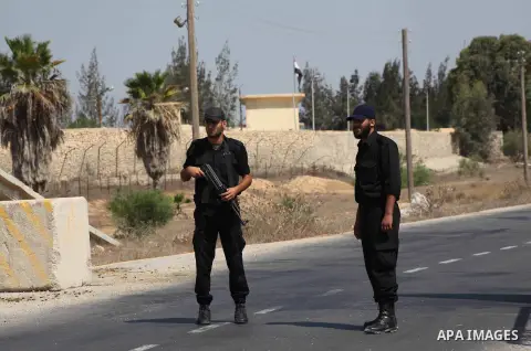 A Palestinian Hamas security guard on duty on the border between Egypt and Gaza strip in Rafah town southern Gaza strip on, 06 August 2012. Reports state that at least five gunmen were killed after they tried to infiltra...