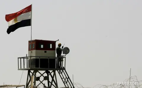 Egyptian soldiers stand guard on the border between Egypt and the southern Gaza Strip, near Rafah August 6, 2012. Egypt has closed the terminal, the only gateway for Gaza's people after the deadly attack on its soldiers...