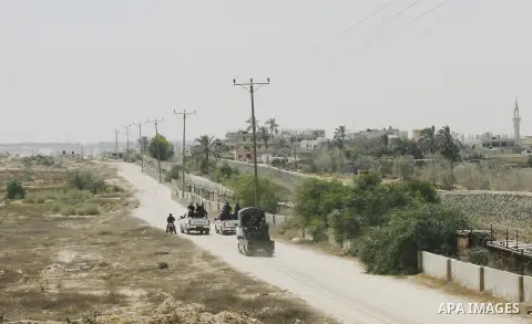 Palestinian security forces stand guard on the border between Egypt and the southern Gaza Strip, near Rafah August 6, 2012. Egypt has closed the terminal, the only gateway for Gaza's people after the deadly attack on its...