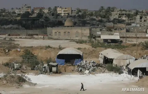 A view of the smuggling tunnels area along Egypt Gaza border is seen from Rafah, southern Gaza Strip, Monday, Aug. 6, 2012. Hamas has shut down tunnel operations after the deadly attack on Egyptian soldiers last night to...