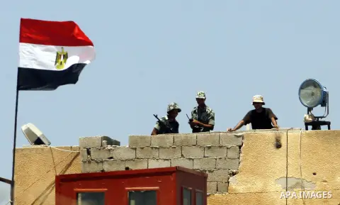 Egyptian soldiers stand guard on the border between Egypt and the southern Gaza Strip, near Rafah August 6, 2012. Egypt has closed the terminal, the only gateway for Gaza's people after the deadly attack on its soldiers...