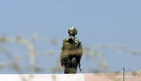 Egyptian soldiers stand guard on the border between Egypt and the southern Gaza Strip, near Rafah August 6, 2012. Egypt has closed the terminal, the only gateway for Gaza's people after the deadly attack on its soldiers...