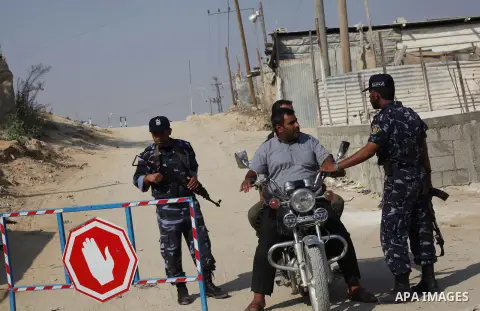 A Palestinian Hamas security guard on duty on the border between Egypt and Gaza strip in Rafah town southern Gaza strip on, 06 August 2012. Reports state that at least five gunmen were killed after they tried to infiltra...