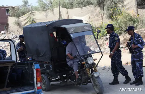 Palestinians Hamas security guard during searching cars near the border between Egypt and Gaza strip in Rafah town southern Gaza strip on, 06 August 2012. Reports state that at least five gunmen were killed after they tr...