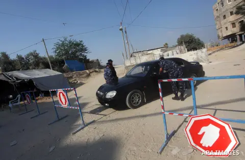Palestinians Hamas security guard during searching cars near the border between Egypt and Gaza strip in Rafah town southern Gaza strip on, 06 August 2012. Reports state that at least five gunmen were killed after they tr...