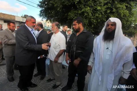 Palestinian Prime Minister in Gaza Strip, Ismail Haniyeh visits the mourning tent of the Egyptian soldiers who were killed on on Rafah border between Egypt and the southern Gaza Strip, on 06 August 2012. Egypt has closed...