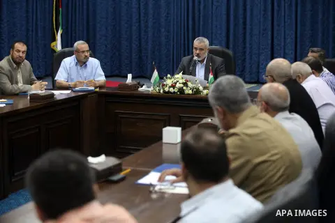 Palestinian Prime Minister in Gaza Ismail Haniyeh chairs a Ministerial meeting to consult in the last events on Rafah border between Egypt and the southern Gaza Strip, on 06 August 2012. Egypt has closed the terminal, th...
