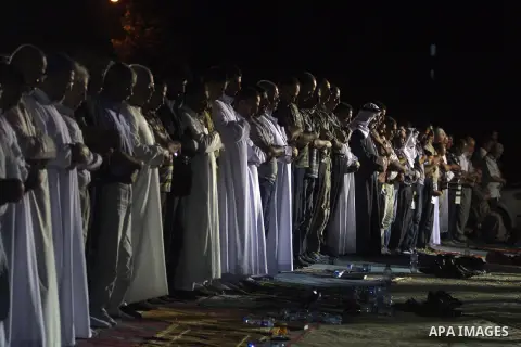 Palestinian Muslims perform a night prayer known as "Tarawih" at the mosque in the West Bank city of Ramallah on Aug. 07, 2012. Photo by Issam Rimawi