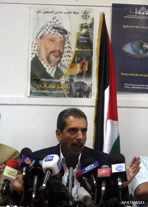 Palestinian Tawfik Terawi, speaks during a press conference in the West Bank city of Ramallah, Wednesday, Aug. 8, 2012. Tirawi said Wednesday Palestinian officials have invited Swiss experts to test the leader's Arafat f...