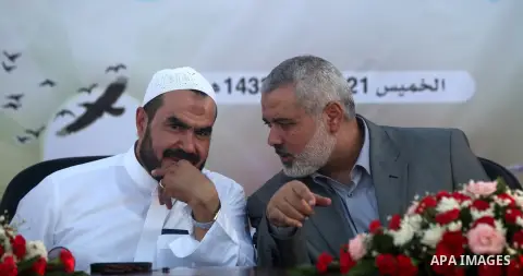 Palestinian Prime Minister in Gaza Strip, Ismail Haniyeh, breaks his fast with a Palestinian released Prisoners during the holy month of Ramadan, in Gaza city on 09 August 2012. Photo by Majdi Fathi