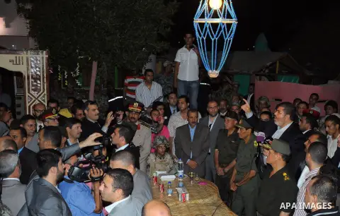 Newly elected Egyptian President Mohamed Mursi is flanked by Field Marshal Hussein Tantawi and Egyptian Armed Forces Chief of Staff Sami Anan as he talks to the soldiers at a checkpoint in al-Arish August 10, 2012. Egypt...