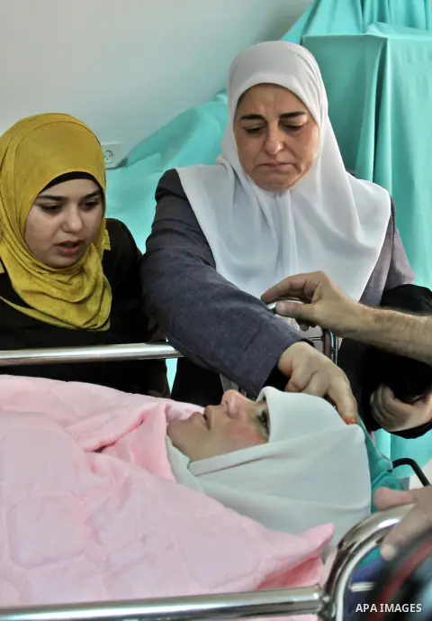 Palestinian Dalal Al Zabin gives birth by IVF , wife of Palestinian Prisoners Ammar Al Zabin, who doomed him 27 Life imprisonment and 25 years held in Israeli jails since 1998, in the West Bank city of Nablus, on Aug. 13...