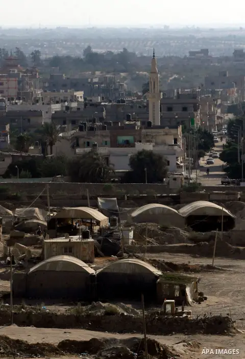 The entrances to smuggling tunnels are seen on the border between Egypt and the southern Gaza Strip, near Rafah August 13, 2012. Egypt began to seal off smuggling tunnels into the Gaza Strip, a security source said, two...