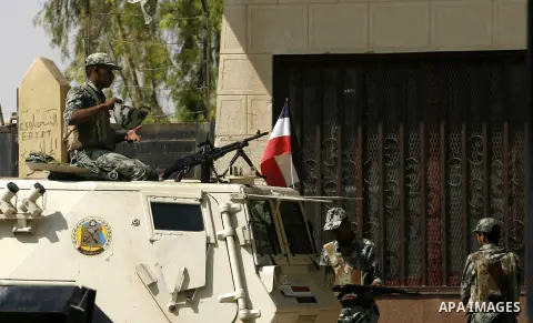 Egyptians soldier guard at Rafah border crossing between Egypt and southern Gaza Strip August 14, 2012. Egypt opened the crossing temporarily on Tuesday, but just for three days, mainly to permit travel for humanitarian...