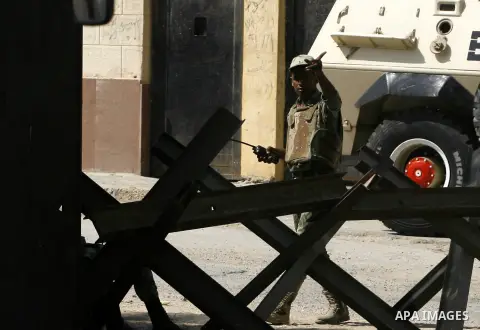 Egyptians soldier guard at Rafah border crossing between Egypt and southern Gaza Strip August 14, 2012. Egypt opened the crossing temporarily on Tuesday, but just for three days, mainly to permit travel for humanitarian...