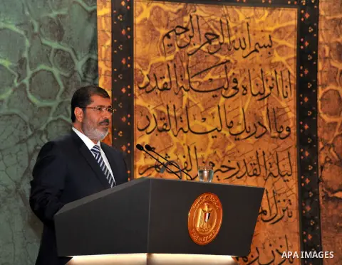 Egypt's President Mohamed Morsi speaks during the Laylat al-Qadr at Egypt Al-Azhar Conference Center in Nasr City in Cairo August 12, 2012. Mursi dismissed Cairo's two top generals and quashed a military order that had c...