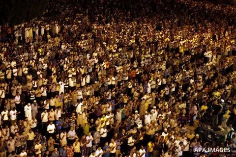 Palestinian Muslim worshippers pray during Laylat Al Qadr, also known as the Night of Power, in front of the Dome of the Rock Mosque, in the Al Aqsa Mosque compound in Jerusalem's Old City, Tuesday Aug 14,2012. Laylat Al...