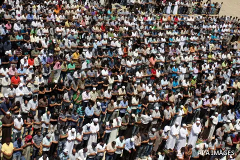 Palestinian Muslim worshippers pray outside the Dome of the Rock at al-Aqsa mosque compound, Islam's third holiest site, on August 17, 2012, in the old city of Jerusalem, on the last Friday of the Muslim holy fasting mon...