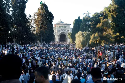 Palestinians attend the Eid al-Fitr prayers at al-Aqsa mosque in Jerusalem's Old City, Sunday, Aug. 19, 2012. Muslims are celebrating the festival of Eid al-Fitr which marks the end of the holy fasting month of Ramadan....