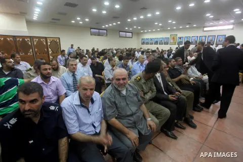 Palestinian Prime Minister in Gaza Ismail Haniyeh (not seen) recieves congratulations of Eid al-Fitr in Gaza city, Aug. 20, 2012. which marks the end of the Muslim fasting month of Ramadan. Eid, one of the most important...