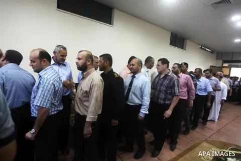 Palestinian Prime Minister in Gaza Ismail Haniyeh (not seen) recieves congratulations of Eid al-Fitr in Gaza city, Aug. 20, 2012. which marks the end of the Muslim fasting month of Ramadan. Eid, one of the most important...