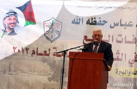 Palestinian President Mahmoud Abbas ( Abu Mazen ) speaks during a graduation ceremony for high school students in the West Bank city of Ramallah, Sunday, Aug 26, 2012. Photo by Issam Rimawi