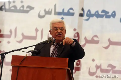 Palestinian President Mahmoud Abbas ( Abu Mazen ) speaks during a graduation ceremony for high school students in the West Bank city of Ramallah, Sunday, Aug 26, 2012. Photo by Issam Rimawi