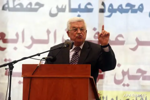 Palestinian President Mahmoud Abbas ( Abu Mazen ) speaks during a graduation ceremony for high school students in the West Bank city of Ramallah, Sunday, Aug 26, 2012. Photo by Issam Rimawi