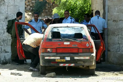 Israeli soldiers and a Israeli settler inside a Palestinian house after Jewish settlers from the Israeli settlement of Livona attacked their house at Al - Loban Village near the west Bank City of Nablus on 28 August 2012...