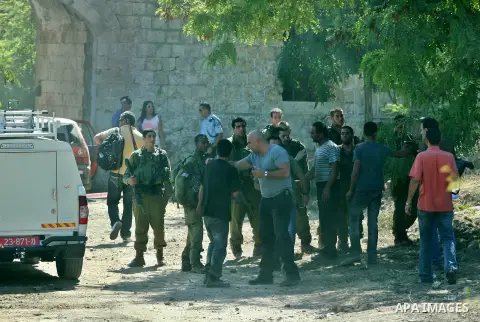 Israeli soldiers and a Israeli settler inside a Palestinian house after Jewish settlers from the Israeli settlement of Livona attacked their house at Al - Loban Village near the west Bank City of Nablus on 28 August 2012...