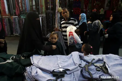 Palestinians shop for the new school year at Rafah's market in the southern Gaza strip on Aug 28, 2012. Next Sunday the First day for the new school year according to Palestinian Ministry of Education in the Gaza strip a...