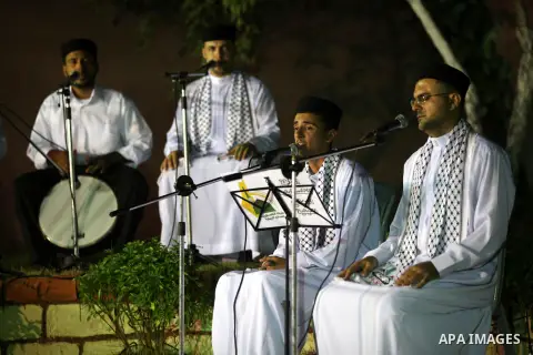 Palestinian Sufi artists performs the sufis songs during a celebration in Gaza city on Aug 28, 2012. Mystic songs symbolizing peace, brotherhood and love. Photo by Majdi Fathi