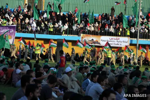 Palestinians attend a festival entitled "Jerusalem in our eyes" organized by Hamas movement, marking the 43rd anniversary of burning down al-Aqsa mosque in Gaza city on 30 Aug 2012. The Australian Jewish Dennis Michael R...