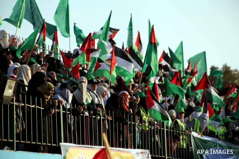 Palestinians attend a festival entitled "Jerusalem in our eyes" organized by Hamas movement, marking the 43rd anniversary of burning down al-Aqsa mosque in Gaza city on 30 Aug 2012. The Australian Jewish Dennis Michael R...