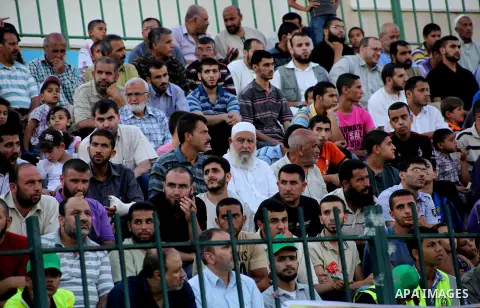 Palestinians attend a festival entitled "Jerusalem in our eyes" organized by Hamas movement, marking the 43rd anniversary of burning down al-Aqsa mosque in Gaza city on 30 Aug 2012. The Australian Jewish Dennis Michael R...
