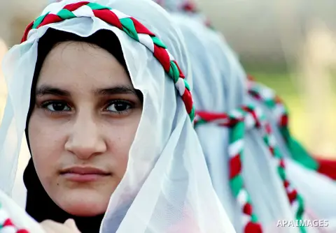 Palestinian girls take part in a festival entitled "Jerusalem in our eyes" organized by Hamas movement, marking the 43rd anniversary of burning down al-Aqsa mosque in Gaza city on 30 Aug 2012. The Australian Jewish Denni...