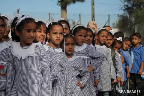 Palestinian students return back to their schools "UNRWA" in the morning of the first day of the new year study in Gaza city on Sep. 02, 2012. The academic year began in the Gaza Strip and West Bank on Sept. 02. Photo by...
