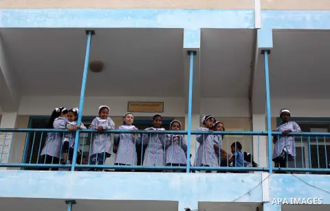 Palestinian students return back to their schools "UNRWA" in the morning of the first day of the new year study in Gaza city on Sep. 02, 2012. The academic year began in the Gaza Strip and West Bank on Sept. 02. Photo by...